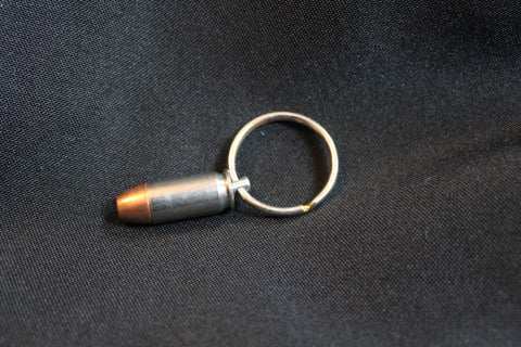 Amazon.com: .223/5.56 AR15 FMJ Nickel Plated Bullet Keychain (Black Flat Key  Ring) : Handmade Products